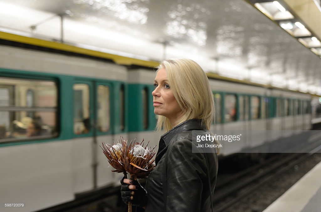 Moving on, she's hoping there's another train and another chance coming. Alone waiting for metro train - Photo Shoot for Getty Images - Ali Lochhead shot by Jac Depczyk in Paris. https://www.gettyimages.com/license/598720079